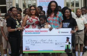L- R: Ndidi Nduka, Branch Manager, Diamond Bank Plc Isolo;  Regina Ezefuna, proprietress, Dreams Schools, Isolo; Ogochukwu Nnake , Winner, School Fees Savers Scholarship; Christiana Nnake, parent of winner, School Fees Savers Scholarship; and Tolulope Sobanjo, Proposition Manager, Diamond Bank Plc at the presentation of cheques to Winners, School Fees Savers Scholarship scheme held in Lagos recently.